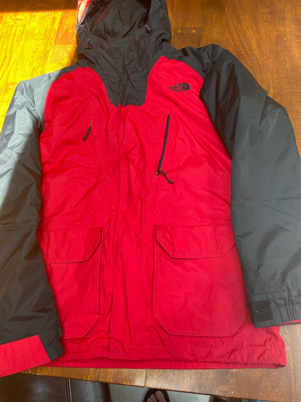 Red and black north face jacket size medium